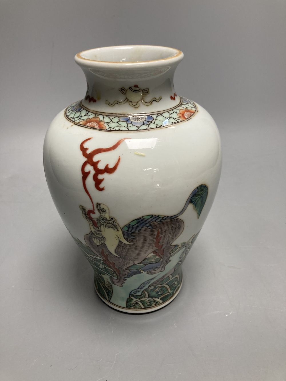 A Chinese famille verte vase, decorated with dragons, height 20cm
